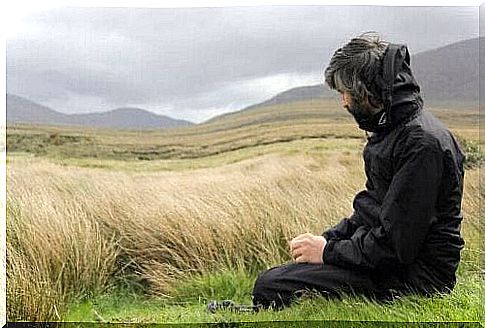 Pensive man in a field