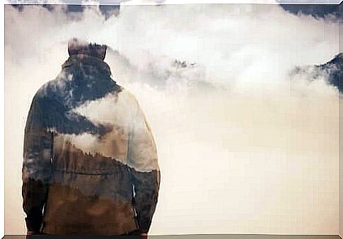 Man in the middle of the clouds