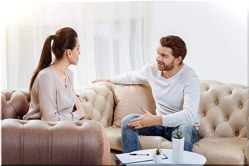 Couple in the living room talking