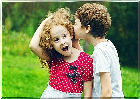 Child talking to a little girl