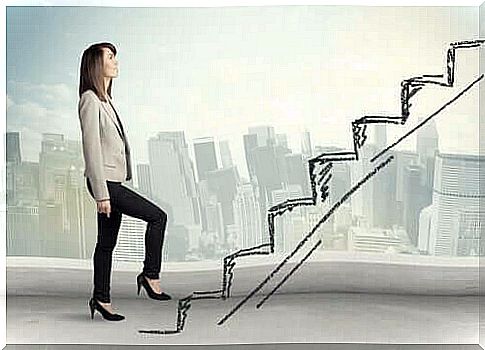 Woman walking up the ladder of success.