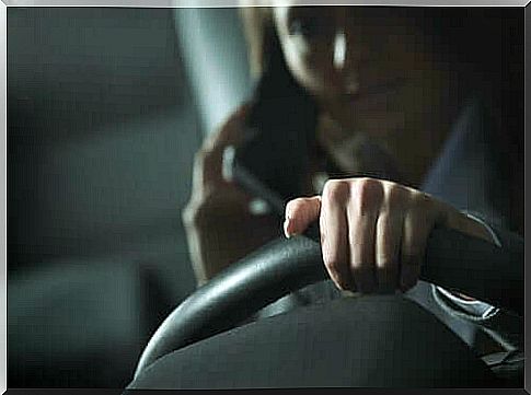 Woman talking on cell phone while driving