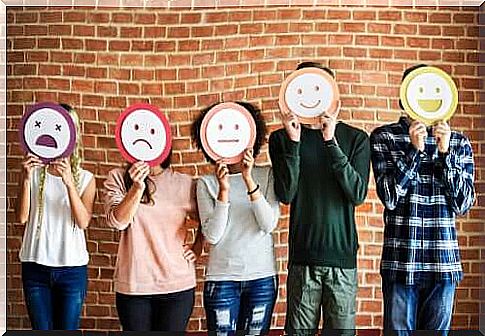 People with masks showing their emotions.