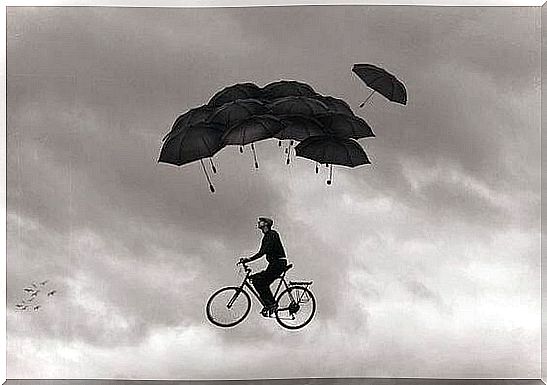 man-flying-by-bike