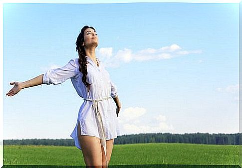 free-woman-in-the-meadow