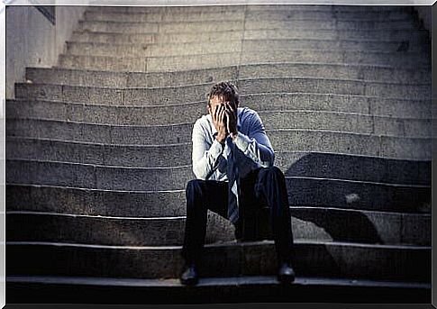 unemployed-man-sitting-on-a-stairway