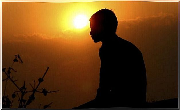 Boy meditates at dawn