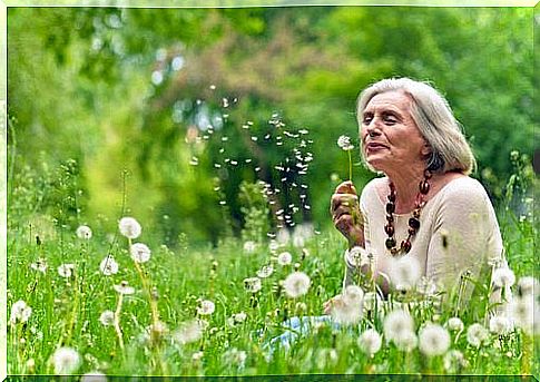 Woman in a field the wisdom of the elderly