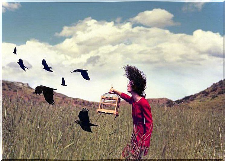 Girl releasing birds