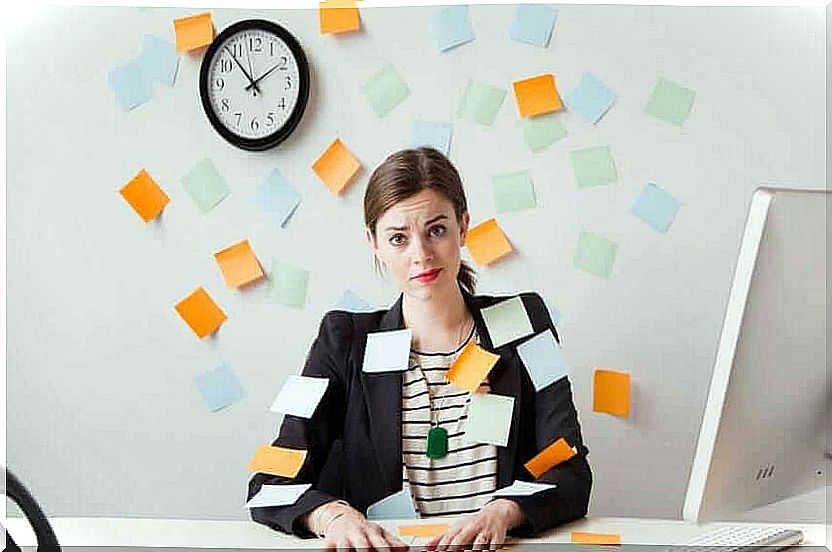 tired girl with post it and clock