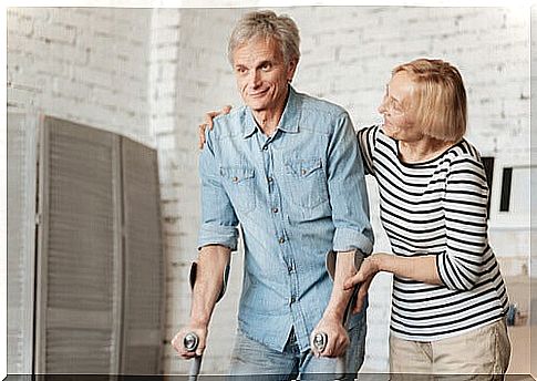 Patient walking with the help of crutches